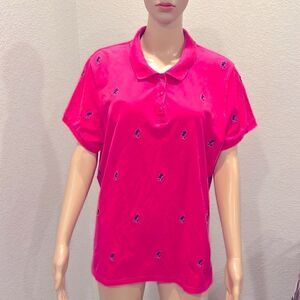 Vintage Disney polo shirt with Mickey Mouse appliqués.